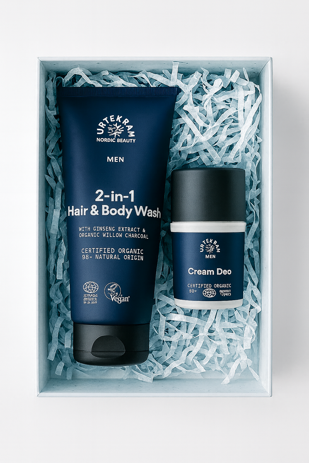 Urtekram vyrų dovanų rinkinys su natūralia kosmetika: 2-in-1 plaukų ir kūno prausiklis bei Cream Deo rutulinis dezodorantas dovanų dėžutėje.